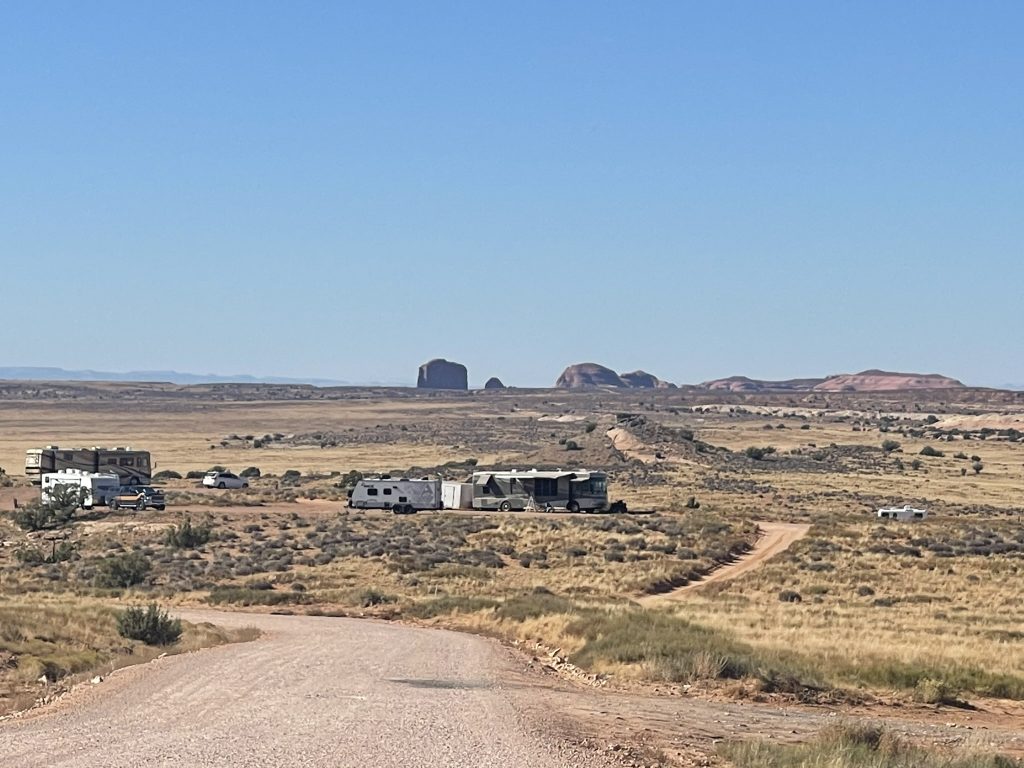 Luxurious Class A RV parked at a scenic campsite, perfect for rental adventures with Northern Lights Recreation