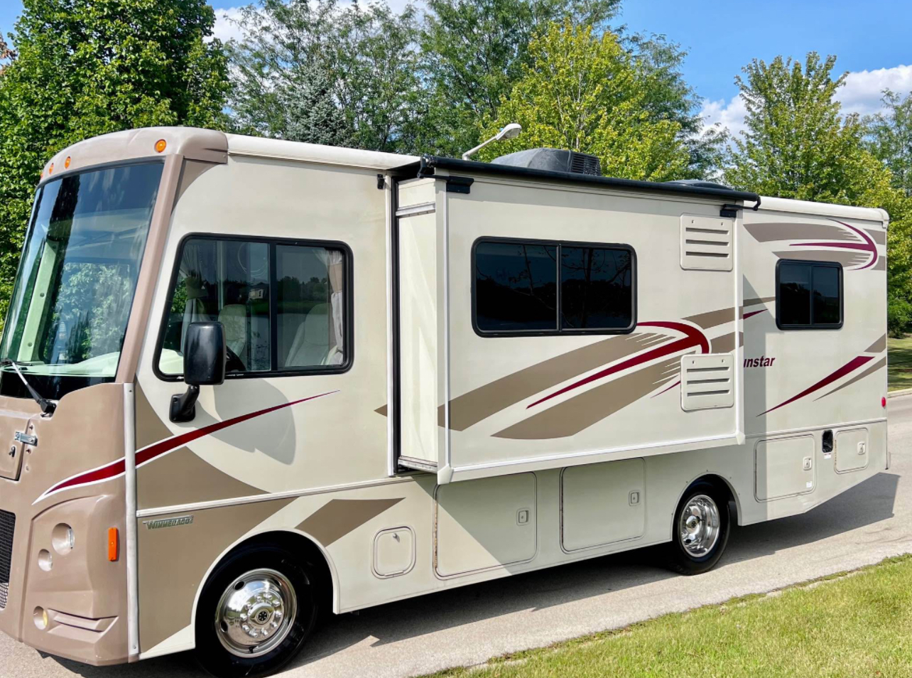 Spacious Class A RV with modern amenities, available for rent at Northern Lights Recreation