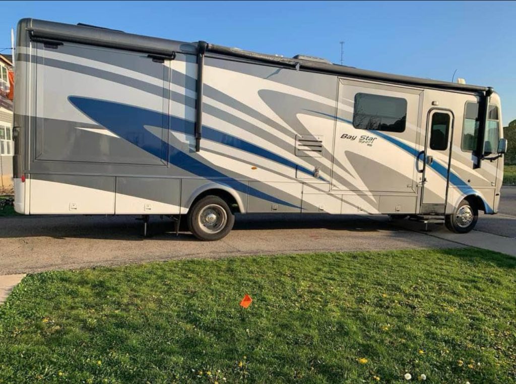 Spacious Class A RV with modern amenities, available for rent at Northern Lights Recreation